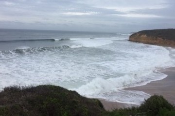 a body of water next to the ocean