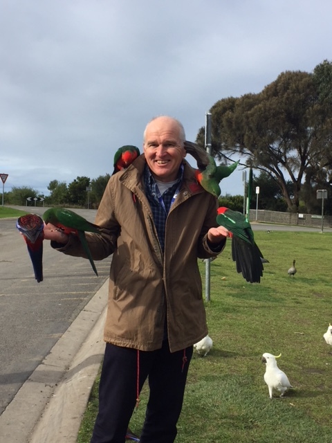 a person that is standing in the grass