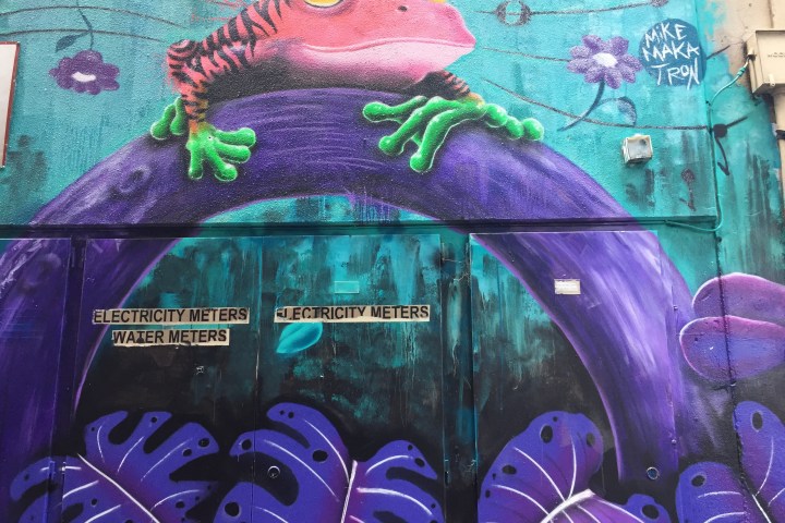 a graffiti covered wall